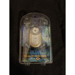 NOS 2003 COBY CX-7 Mini AM/FM Pocket Radio DBBS Earphone Belt Clip Neck Strap C2